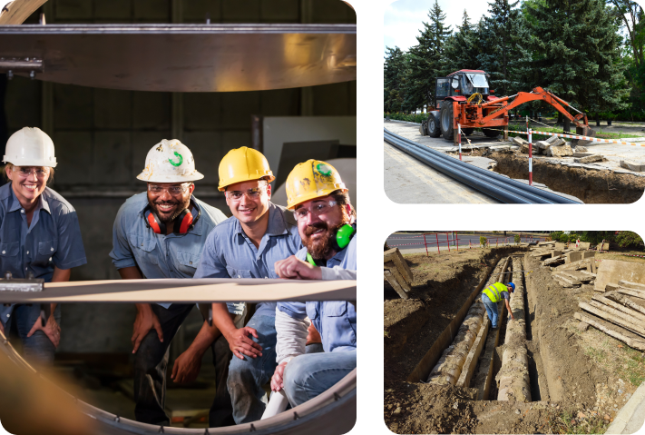 Construction workers installing large pipes.